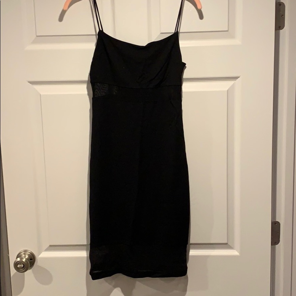 Spaghetti strap black dress.